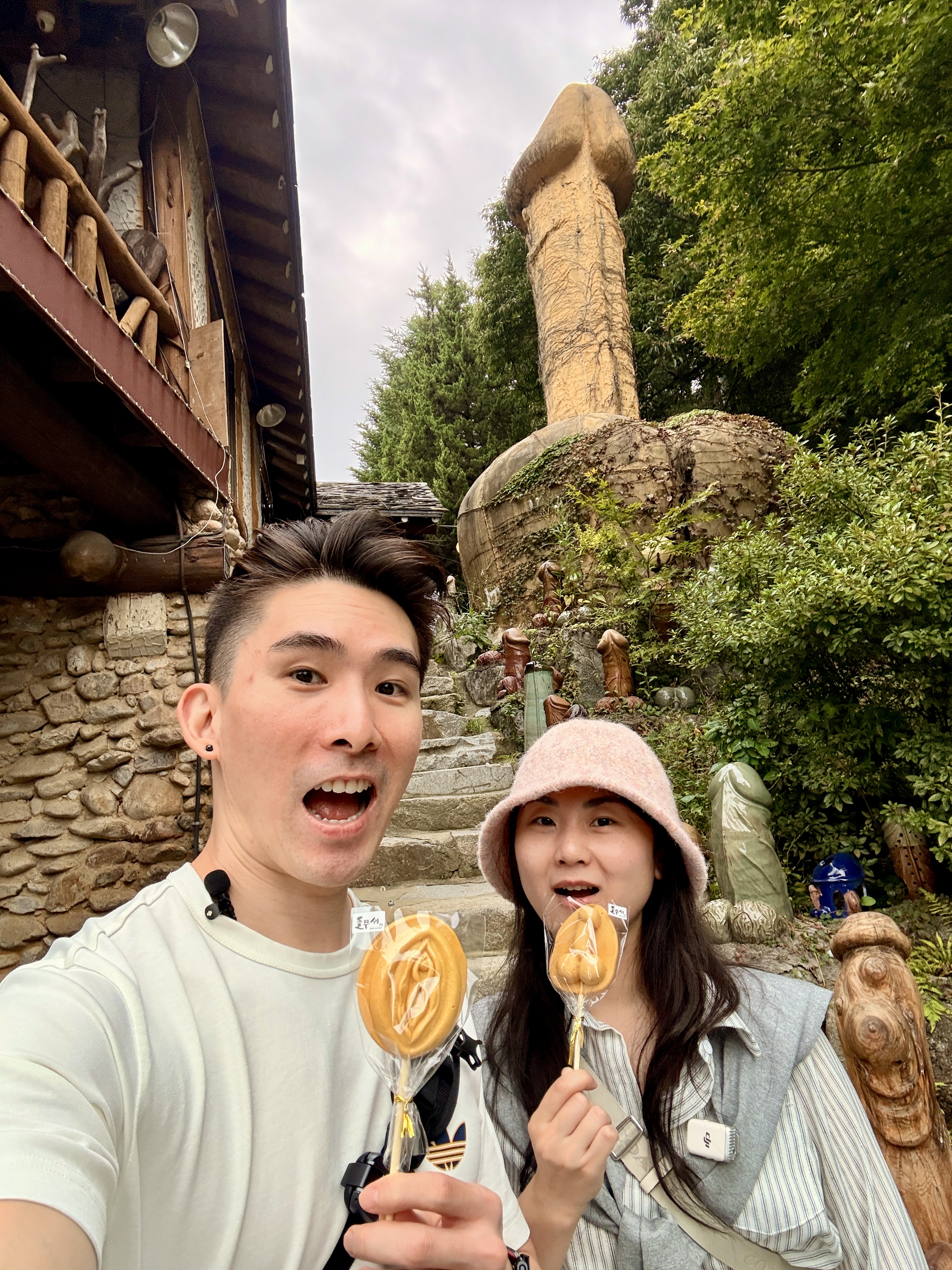 Vincent and Christina posing with the giant kkochu statue at Deulmusae