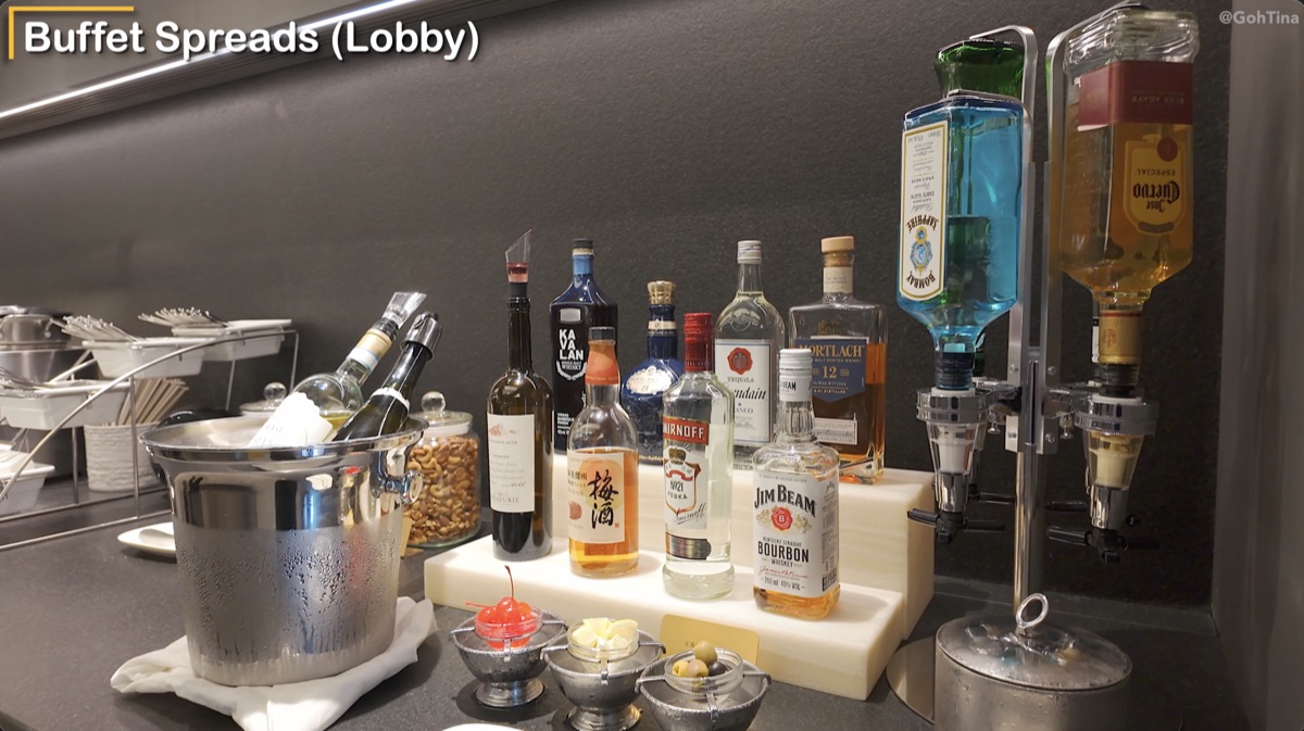 Self-serve cocktail and alcohol bar at the Starlux Galactic Lounge