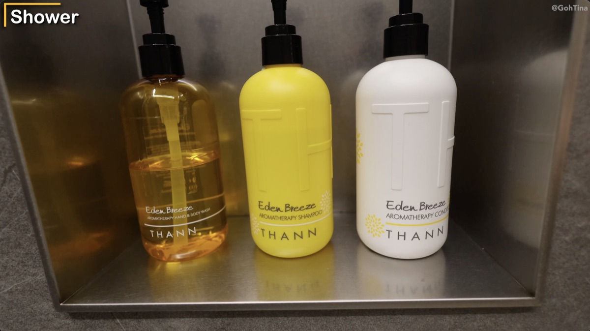 Shampoo, conditioner, and body wash in the Starlux Galactic Lounge shower
