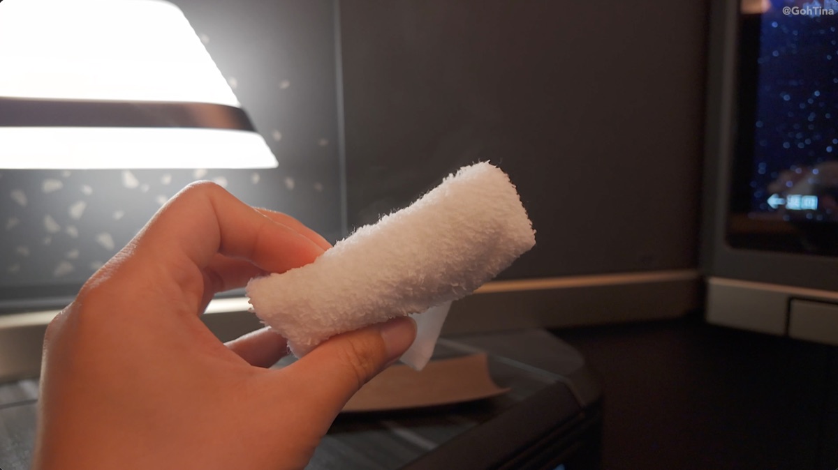 Steaming hot towel served in Starlux business class