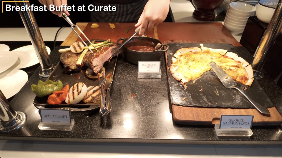 Beef brisket and pizza at Curate breakfast
