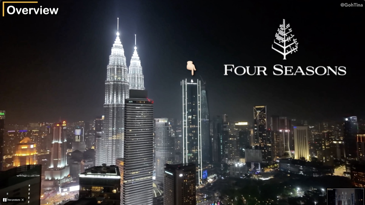 Four Seasons Kuala Lumpur next to the Petronas Twin Towers at night