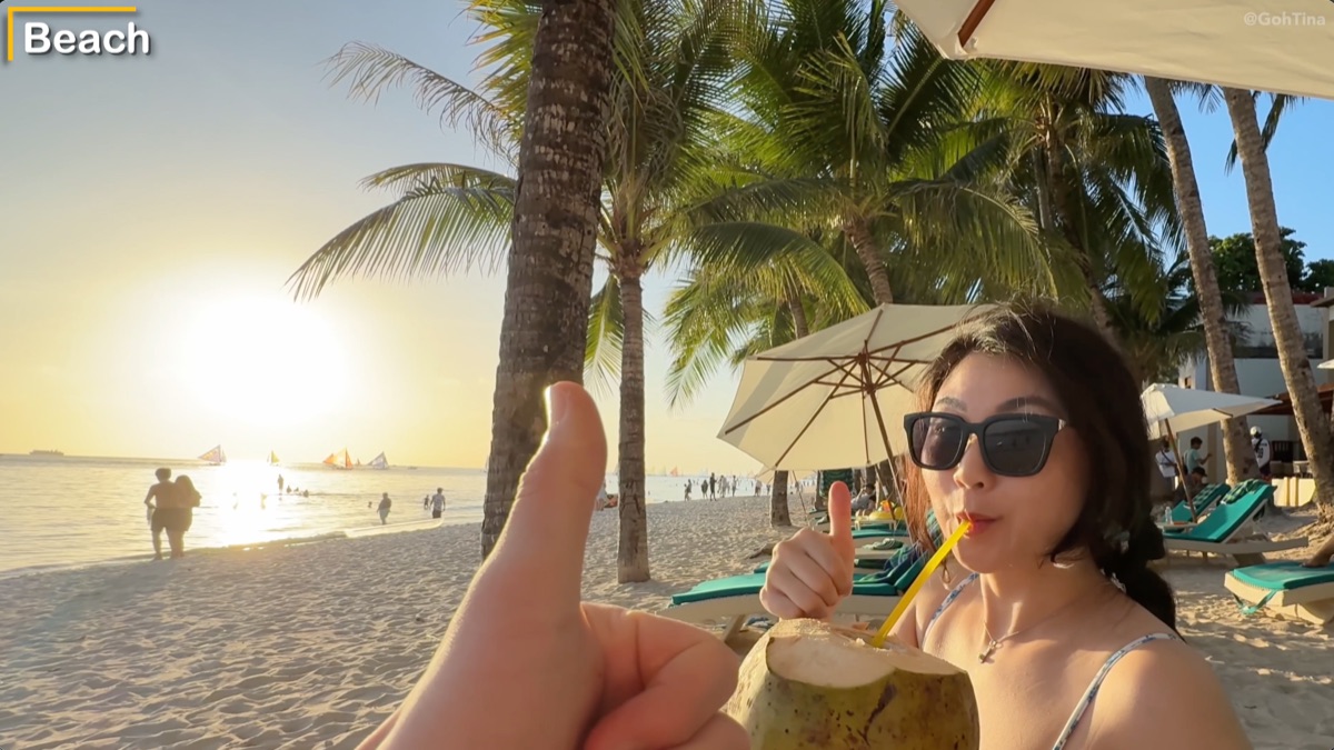 Fresh coconut at sunset on the Boracay beach