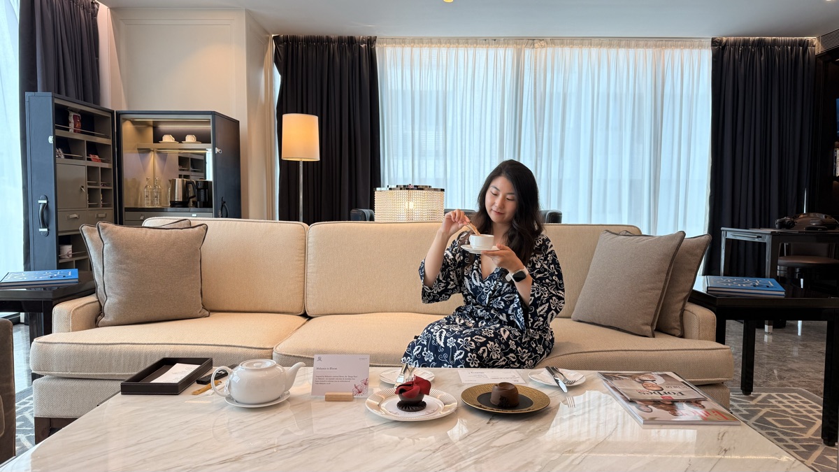 Enjoying butler tea service in the living room