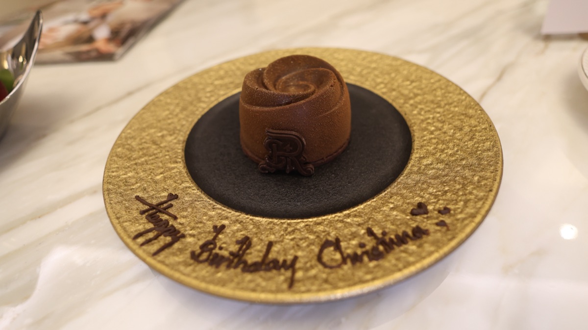 Chocolate rose cake reading Happy Birthday Christina