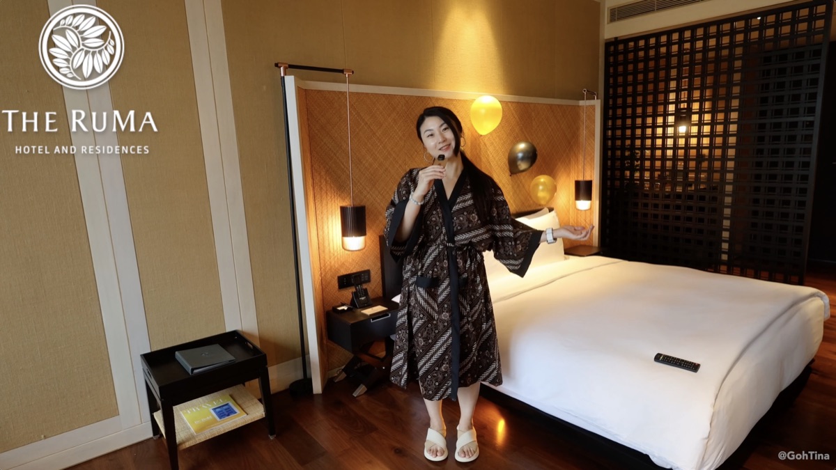 Posing in the room with The RuMa logo
